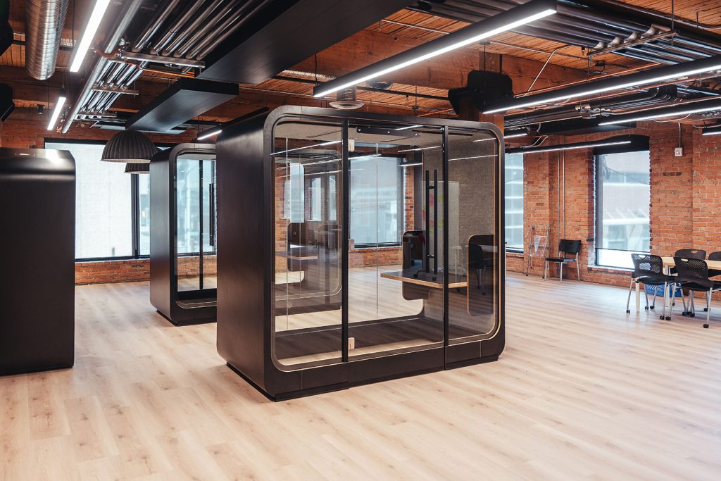 Loop Access Phone Booth in an exposed brick office